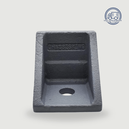Steel bolt-down anchor bracket that twists into the corner casting to fix a container in place, angle view