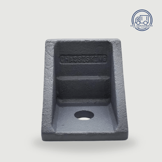 Steel bolt-down anchor bracket that twists into the corner casting to fix a container in place, angle view