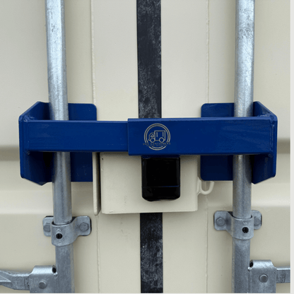 Heavy-duty blue steel shipping container door bar lock system securing vertical door bars against unauthorized access.