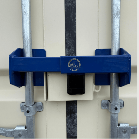 Heavy-duty blue steel shipping container door bar lock system securing vertical door bars against unauthorized access.