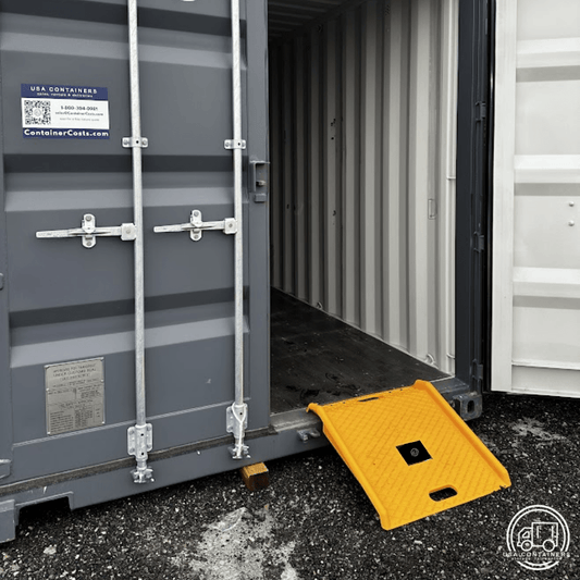 Bright yellow lightweight shipping container ramp with easy carry handles for safe loading and unloading.