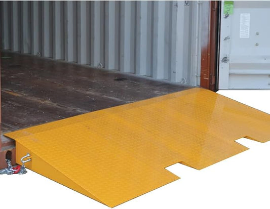 Heavy duty yellow steel forklift ramp bridging ground to shipping container loading dock